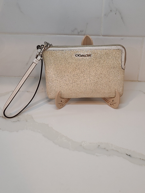 Coach Handbags - COACH Metallic Beige Wristlet Pouch